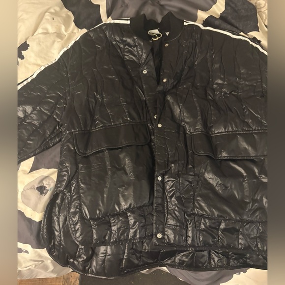 Nearly new lightweight adidas Black Puffer Jacket with White Stripes. - Picture 6 of 6